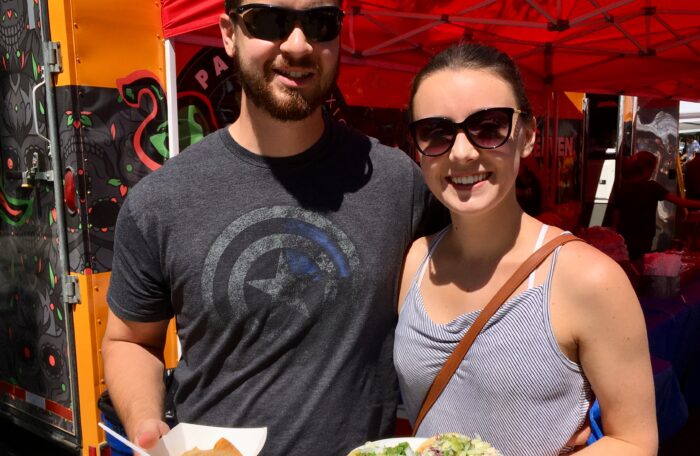 MARKET COUPLE WITH FOOD